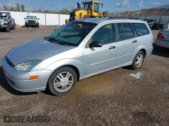 2001 Ford Focus SE z VIN 1FAFP363X1W343475, wystawiony jako IAAI lot #42390133 z przebiegiem 127 282 mil mil oraz . Historia ofert i sprzedaży dostępna na DreamBid. Obrazek 2.