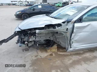2023 Nissan Sentra S z VIN 3N1AB8BV7PY311515, wystawiony jako IAAI lot #42038589 z przebiegiem 13 907 mil mil oraz . Historia ofert i sprzedaży dostępna na DreamBid. Obrazek 6.