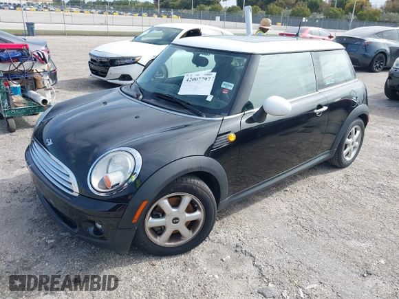2010 MINI Hardtop with VIN WMWMF3C5XATU77265, listed as a IAAI auction lot 42007797 with 28,856 mi miles and . Bid and sale history available at DreamBid. Image 2.