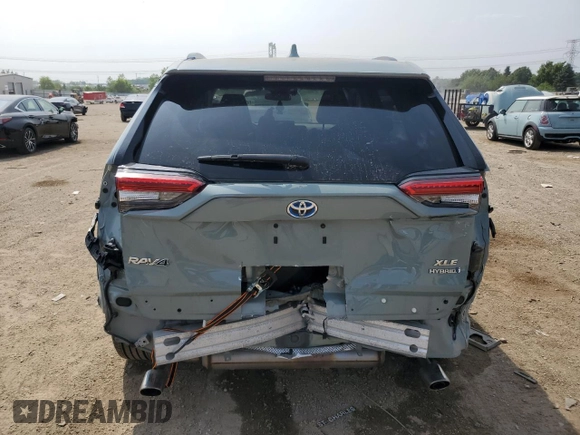 2022 Toyota RAV4 Hybrid XLE Premium with VIN 4T3B6RFV8NU101319, listed as a Copart auction lot 60987535 with 100,070 mi miles and Salvage title. Bid and sale history available at DreamBid. Image 6.