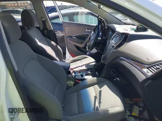 2017 Hyundai Santa Fe 2.4L z VIN 5XYZTDLB0HG403842, wystawiony jako IAAI lot #42206543 z przebiegiem 77 900 mil mil oraz . Historia ofert i sprzedaży dostępna na DreamBid. Obrazek 5.