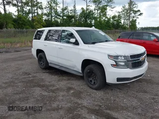2015 Chevrolet Tahoe Commercial with VIN 1GNLC2ECXFR559652, listed as a IAAI auction lot 42727539 with 112,026 mi miles and . Bid and sale history available at DreamBid. Image 1.