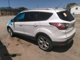 2017 Ford Escape Titanium with VIN 1FMCU0JD8HUE52149, listed as a IAAI auction lot 41974274 with 143,707 mi miles and . Bid and sale history available at DreamBid. Image 3.