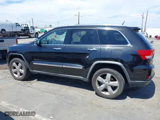 2012 Jeep Grand Cherokee Overland with VIN 1C4RJFCT7CC185602, listed as a IAAI auction lot 42018715 with 91,507 mi miles. Bid and sale history available at carsss.com. Image 14.