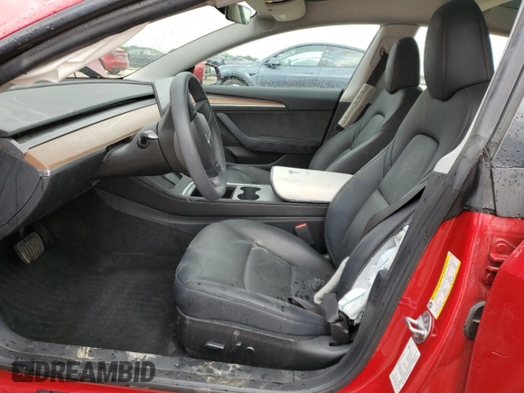 2023 Tesla Model 3 with VIN 5YJ3E1EA3PF698265, listed as a Copart auction lot 53067455 with 12,192 mi miles and Salvage title. Bid and sale history available at DreamBid. Image 7.