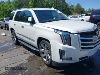 2016 Cadillac Escalade Luxury Collection z VIN 1GYS4BKJ5GR173625, wystawiony jako IAAI lot #42004159 z przebiegiem 169 437 mil mil oraz . Historia ofert i sprzedaży dostępna na DreamBid. Obrazek 1.
