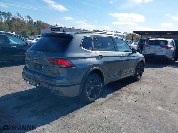 2023 Volkswagen Tiguan SE R-Line Black with VIN 3VVCB7AX7PM132001, listed as a IAAI auction lot 41042085 with 15,007 mi miles. Bid and sale history available at carsss.com. Image 4.