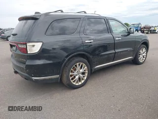 2014 Dodge Durango Citadel with VIN 1C4SDJET5EC314304, listed as a IAAI auction lot 42682540 with 213,651 mi miles and . Bid and sale history available at DreamBid. Image 4.