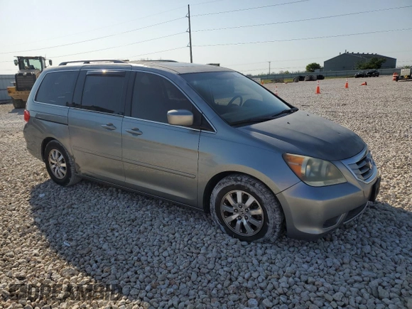 2009 Honda Odyssey EX-L with VIN 5FNRL38799B034292, listed as a Copart auction lot 52547205 with 116,658 mi miles and Salvage Title. Bid and sale history available at DreamBid. Image 4.