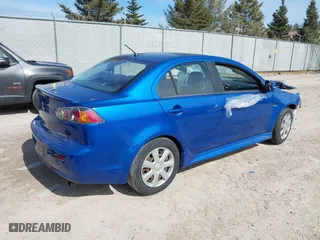 2015 Mitsubishi Lancer ES with VIN JA32U2FU1FU014816, listed as a IAAI auction lot 41783106 with 156,226 mi miles. Bid and sale history available at carsss.com. Image 4.