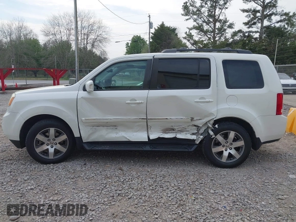 2014 Honda Pilot Touring with VIN 5FNYF4H93EB023602, listed as a IAAI auction lot 41909653 with 162,118 mi miles and . Bid and sale history available at carsss.com. Image 14.