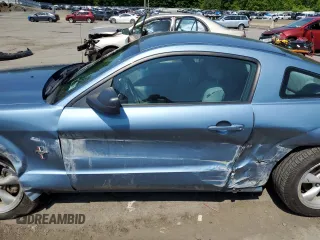 2007 Ford Mustang Deluxe with VIN 1ZVHT80N275327594, listed as a Copart auction lot 58373975 with 123,031 mi miles and Salvage title. Bid and sale history available at DreamBid. Image 7.