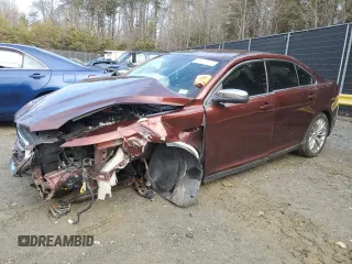2015 Ford Taurus Limited with VIN 1FAHP2J8XFG143784, listed as a Copart auction lot 44263145 with 67,844 mi miles and Salvage Title. Bid and sale history available at carsss.com. Image 1.