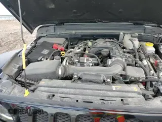 2023 Jeep Wrangler Willys with VIN 1C4HJXDG6PW663824, listed as a Copart auction lot 57761905 with 15,040 mi miles and Salvage title. Bid and sale history available at DreamBid. Image 13.