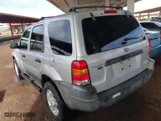 2004 Ford Escape XLT with VIN 1FMYU03104KA40905, listed as a IAAI auction lot 41874929 with 241,187 mi miles. Bid and sale history available at carsss.com. Image 3.