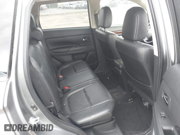 2014 Mitsubishi Outlander GT with VIN JA4JZ4AX9EZ017406, listed as a IAAI auction lot 42291696 with 107,680 mi miles and . Bid and sale history available at DreamBid. Image 8.