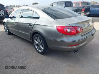2010 Volkswagen CC Lux with VIN WVWHN7AN4AE530337, listed as a IAAI auction lot 41244342 with 100,819 mi miles. Bid and sale history available at carsss.com. Image 3.