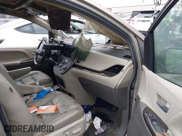 2015 Toyota Sienna XLE with VIN 5TDYK3DC5FS545345, listed as a IAAI auction lot 42280661 with Not provided miles and . Bid and sale history available at DreamBid. Image 5.