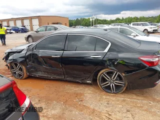 2016 Honda Accord Touring with VIN 1HGCR3F90GA012715, listed as a IAAI auction lot 42399280 with 140,786 mi miles and . Bid and sale history available at DreamBid. Image 14.