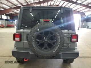2021 Jeep Wrangler Unlimited Willys with VIN 1C4HJXDNXMW648849, listed as a Copart auction lot 55942895 with 28,240 mi miles and Salvage Title. Bid and sale history available at DreamBid. Image 6.