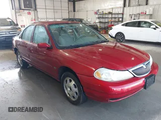 1999 Mercury Mystique GS z VIN 1MEFM6536XK637928, wystawiony jako IAAI lot #41850298 z przebiegiem 219 329 mil mil oraz . Historia ofert i sprzedaży dostępna na DreamBid. Obrazek 1.