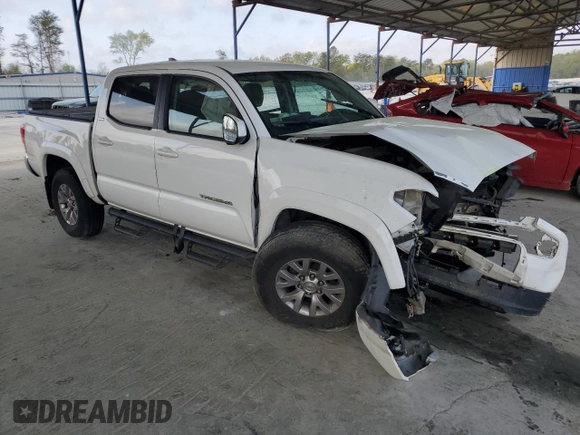 2016 Toyota Tacoma SR with VIN 5TFCZ5AN9GX014233, listed as a Copart auction lot 52016485 with 260,017 mi miles and Salvage Title. Bid and sale history available at carsss.com. Image 4.