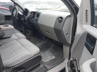 2005 Ford F-150 XL with VIN 1FTRF12W15KC00040, listed as a IAAI auction lot 41532710 with 172,371 mi miles. Bid and sale history available at carsss.com. Image 5.