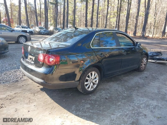 2010 Volkswagen Jetta Sedan Limited with VIN 3VWRX7AJ8AM035447, listed as a IAAI auction lot 41598577 with 146,888 mi miles. Bid and sale history available at carsss.com. Image 4.