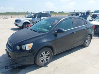2015 Chevrolet Sonic LT with VIN 1G1JC5SH7F4160978, listed as a IAAI auction lot 42229099 with 211,664 mi miles and . Bid and sale history available at DreamBid. Image 2.