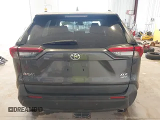 2019 Toyota RAV4 XLE with VIN 2T3P1RFV8KW057323, listed as a IAAI auction lot 42510231 with 59,003 mi miles and . Bid and sale history available at DreamBid. Image 17.