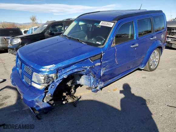 2007 Dodge Nitro R/T with VIN 1D8GU58607W687062, listed as a Copart auction lot 86003844 with 215,352 mi miles and Salvage Title. Bid and sale history available at carsss.com. Image 1.