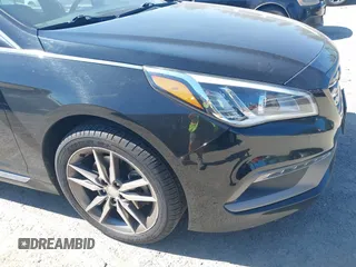 2015 Hyundai Sonata Sport z VIN 5NPE34AB5FH198560, wystawiony jako IAAI lot #42467031 z przebiegiem 96 111 mil mil oraz . Historia ofert i sprzedaży dostępna na DreamBid. Obrazek 6.