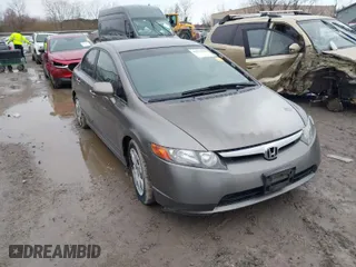 2007 Honda Civic Sdn LX with VIN 2HGFA16537H310702, listed as a IAAI auction lot 41913848 with 301,029 mi miles. Bid and sale history available at carsss.com. Image 1.