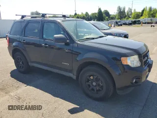 2010 Ford Escape Hybrid with VIN 1FMCU4K38AKC98072, listed as a Copart auction lot 58192375 with 123,958 mi miles and Salvage title. Bid and sale history available at DreamBid. Image 4.