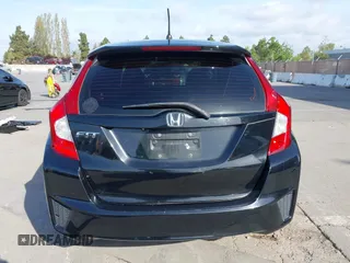 2015 Honda Fit LX with VIN 3HGGK5G5XFM737172, listed as a IAAI auction lot 42053332 with 80,690 mi miles and . Bid and sale history available at carsss.com. Image 16.