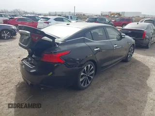 2016 Nissan Maxima SL z VIN 1N4AA6AP1GC379279, wystawiony jako IAAI lot #41738089 z przebiegiem 113 677 mil mil oraz . Historia ofert i sprzedaży dostępna na DreamBid. Obrazek 4.
