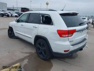2013 Jeep Grand Cherokee Limited with VIN 1C4RJFBT3DC545662, listed as a IAAI auction lot 41576431 with 153,142 mi miles. Bid and sale history available at carsss.com. Image 3.