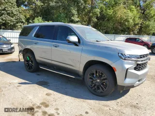 2023 Chevrolet Tahoe LS with VIN 1GNSCMKDXPR198087, listed as a Copart auction lot 75393274 with 50,764 mi miles and Salvage Title. Bid and sale history available at carsss.com. Image 4.