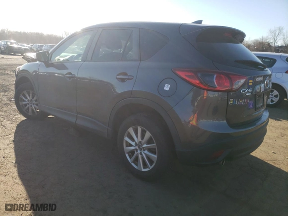 2016 Mazda CX-5 Touring with VIN JM3KE4CY7G0815137, listed as a Copart auction lot 50444665 with 61,681 mi miles and Salvage Title. Bid and sale history available at carsss.com. Image 2.