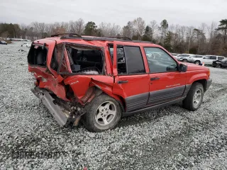 1998 Jeep Grand Cherokee Laredo with VIN 1J4GZ58S6WC104114, listed as a Copart auction lot 84232604 with 0 mi miles and Salvage Title. Bid and sale history available at carsss.com. Image 3.
