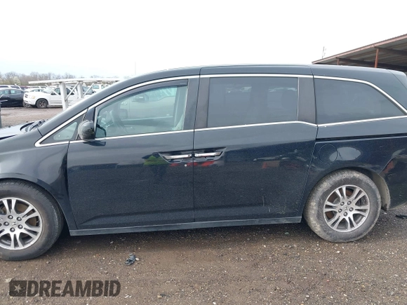 2012 Honda Odyssey EX with VIN 5FNRL5H46CB096547, listed as a IAAI auction lot 41919700 with 165,882 mi miles and . Bid and sale history available at carsss.com. Image 14.