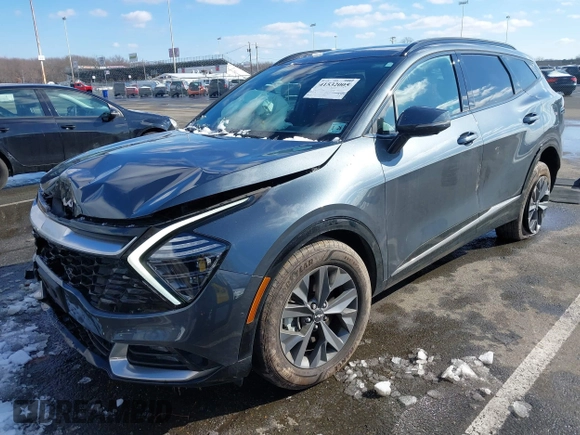 2023 Kia Sportage SX-Prestige with VIN KNDPXCAG5P7038476, listed as a IAAI auction lot 41532005 with 14,151 mi miles and . Bid and sale history available at DreamBid. Image 2.