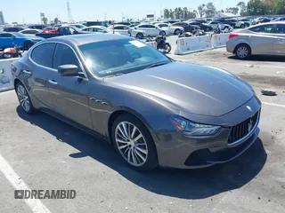 2015 Maserati Ghibli with VIN ZAM57XSA9F1140398, listed as a IAAI auction lot 42719719 with 95,108 mi miles and . Bid and sale history available at DreamBid. Image 1.