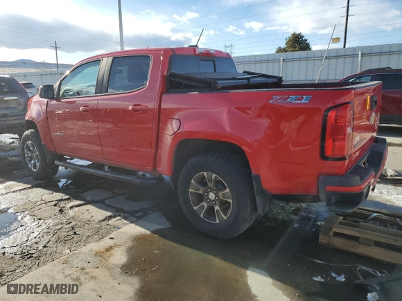2019 Chevrolet Colorado 4WD Z71 with VIN 1GCGTDEN5K1239977, listed as a Copart auction lot 87860595 with 131,101 mi miles and Salvage Title. Bid and sale history available at carsss.com. Image 2.
