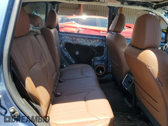 2020 Subaru Forester Touring with VIN JF2SKAXC9LH452951, listed as a Copart auction lot 56428495 with 12,390 mi miles and Salvage title. Bid and sale history available at DreamBid. Image 10.
