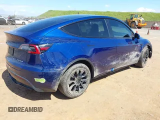 2020 Tesla Model Y Long Range with VIN 5YJYGDEF4LF000494, listed as a IAAI auction lot 41894856 with 118,638 mi miles and . Bid and sale history available at DreamBid. Image 4.
