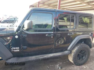 2018 Jeep Wrangler Unlimited Sport S z VIN 1C4HJXDG9JW172686, wystawiony jako IAAI lot #41742837 z przebiegiem 89 888 mil mil oraz . Historia ofert i sprzedaży dostępna na DreamBid. Obrazek 14.