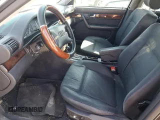 1997 Audi A6 z VIN WAUGA84A4VN006453, wystawiony jako Copart lot #47408094 z przebiegiem 333 651 mil mil oraz Szkody całkowita. Historia ofert i sprzedaży dostępna na DreamBid. Obrazek 7.