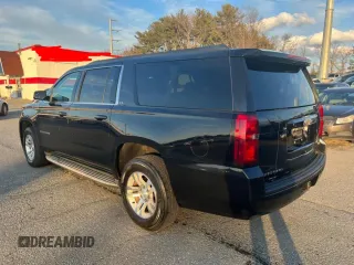 2015 Chevrolet Suburban with VIN 1GNSKHEC4FR25217, listed as a Copart auction lot 65346775 with 213,363 mi miles and Clean title. Bid and sale history available at DreamBid. Image 3.