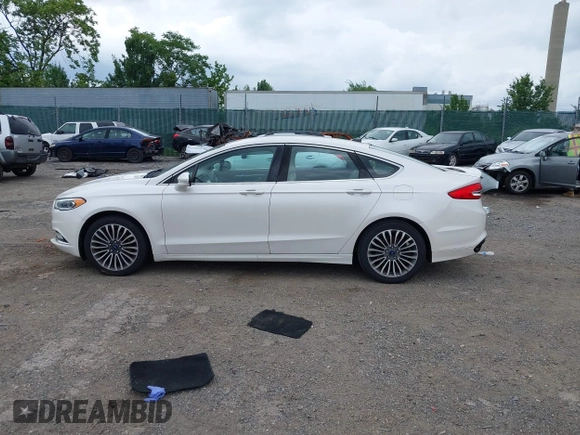 2017 Ford Fusion Titanium with VIN 3FA6P0K96HR115561, listed as a IAAI auction lot 42596030 with 187,865 mi miles and . Bid and sale history available at DreamBid. Image 15.